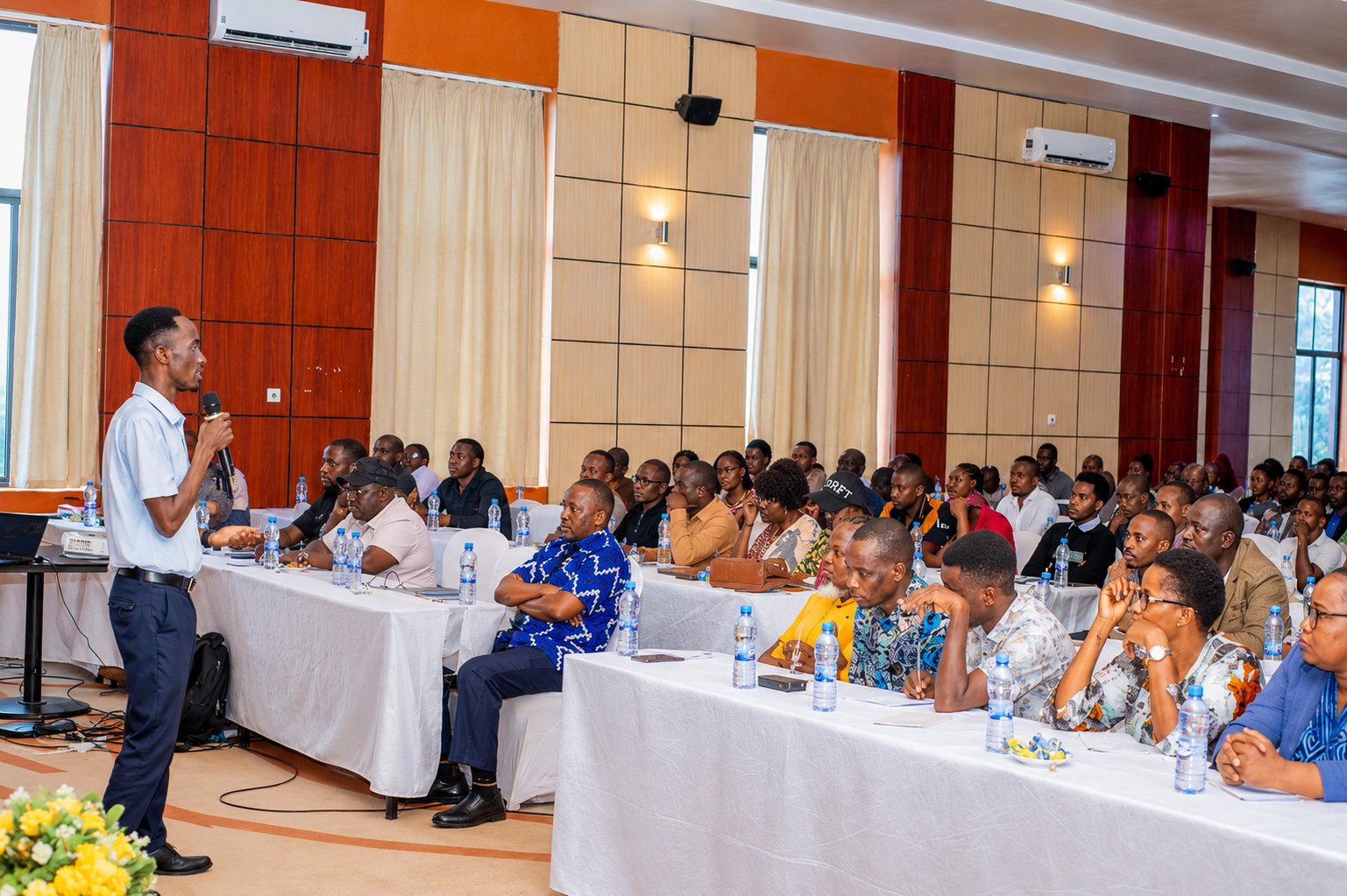Dr. Azael Haward Kyando speaking at event